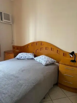 Uma cama ou camas num quarto em Apto a 80 metros do mar para 8 pessoas