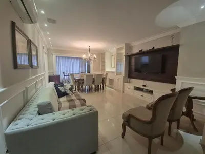 Uma televisão e/ou sistema de entretenimento em Cod816 Apartamento Verão Meia Praia