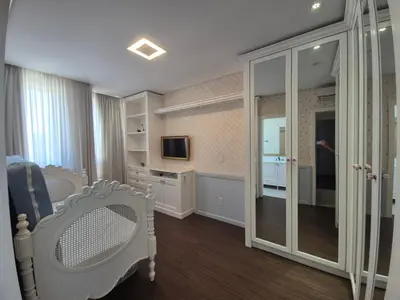 Uma televisão e/ou sistema de entretenimento em Cod816 Apartamento Verão Meia Praia