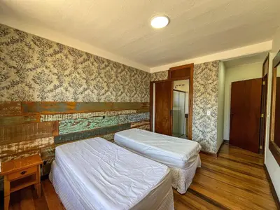 Uma cama ou camas num quarto em c620 - Apartamento Frente Mar - Bombinhas/SC