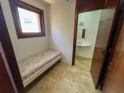 Uma cama ou camas num quarto em c620 - Apartamento Frente Mar - Bombinhas/SC
