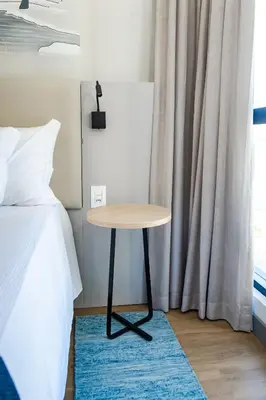 Uma cama ou camas num quarto em Apartamento quadra mar, 200m da praia - Meia Praia