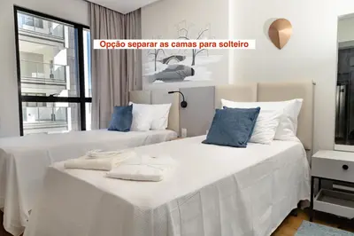 Uma cama ou camas num quarto em Apto 2003 - Frente mar, 200m da Praia, Restaurantes e Hard Rock Café