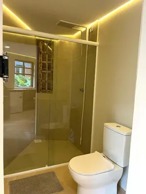 Uma casa de banho em Studio Com Hidro e Cromoterapia Baoba Suites