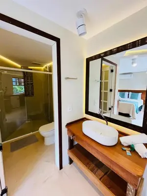 Uma casa de banho em Studio Com Hidro e Cromoterapia Baoba Suites