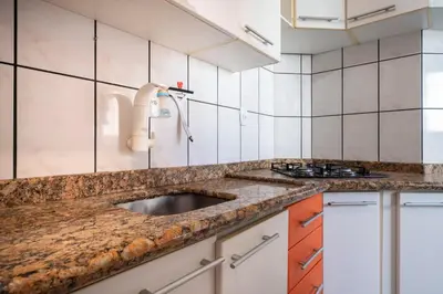 A cozinha ou kitchenette de Amplo e aconchegante 100m da praia RA6386