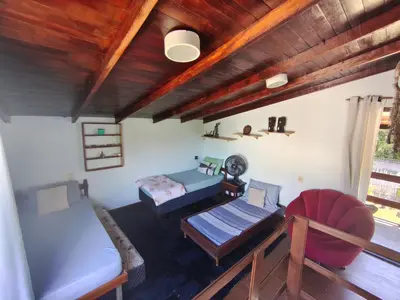 Uma área de estar em Sobrado ROOTS Bombinhas