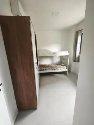 Uma cama ou camas num quarto em Tâmisa Residence Com Vista Mar
