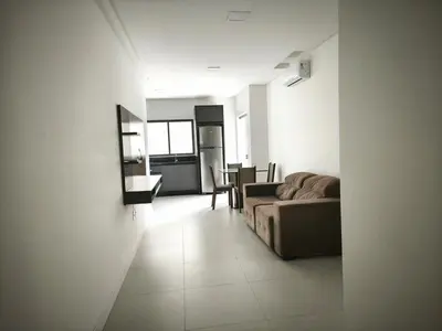 Uma área de estar em Tâmisa Residence Com Vista Mar