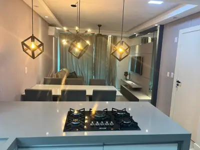 A cozinha ou kitchenette de Plus Home Condominio na Praia de Perequê em Porto Belo