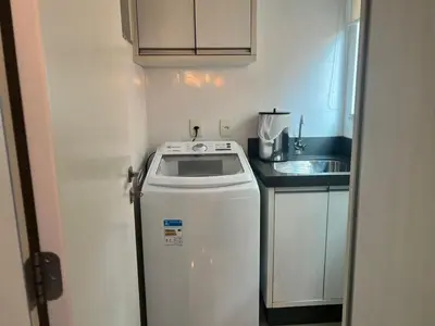 A cozinha ou kitchenette de Plus Home Condominio na Praia de Perequê em Porto Belo