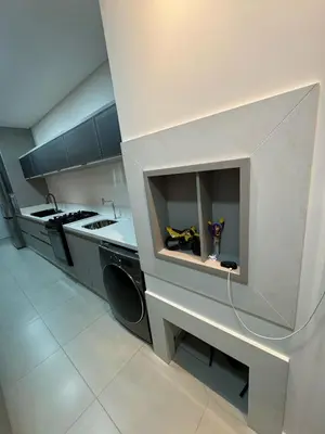 A cozinha ou kitchenette de Apartamento novo com vista para o mar Bom gosto