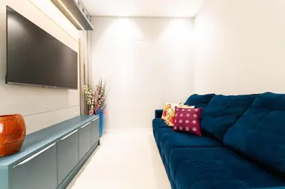 Uma televisão e/ou sistema de entretenimento em Cobertura Duplex 205