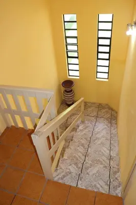Uma cama ou camas num quarto em Casa de frete para o mar em Porto Belo