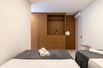 Uma cama ou camas num quarto em Apto c/ Churrasqueira a 300m da Praia MTR0502