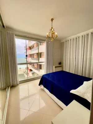 Uma cama ou camas num quarto em Apartamento Meia Praia - Sensation 801