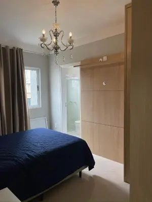 Uma cama ou camas num quarto em Apartamento Meia Praia - Sensation 801