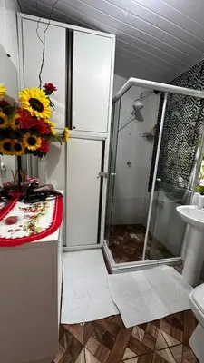 Uma casa de banho em Casa Temporada Aconchegante