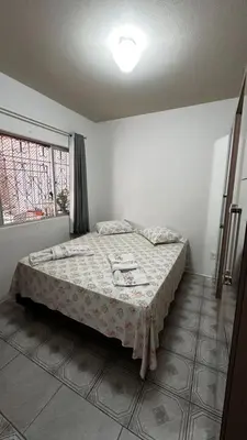 Uma cama ou camas num quarto em Casa Temporada Aconchegante
