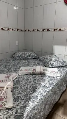 Uma cama ou camas num quarto em Casa Temporada Aconchegante