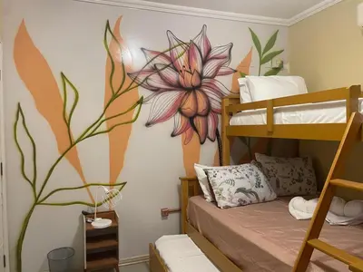 Uma cama ou camas num quarto em Casa ao mar -Pousada Itapema