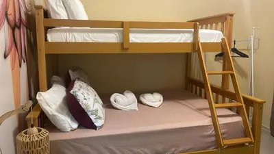 Uma cama ou camas num quarto em Casa ao mar -Pousada Itapema