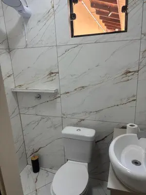 Uma casa de banho em Casa ao mar -Pousada Itapema