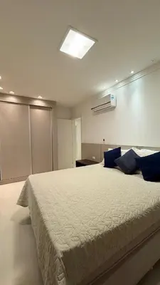 Uma cama ou camas num quarto em Apartamento luxo Praia Meia Praia