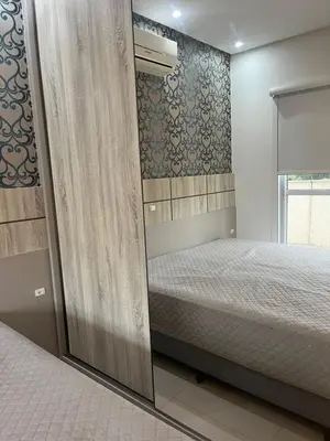 Uma cama ou camas num quarto em Cobertura de 2 suites no centro de Bombinhas by RD Stay