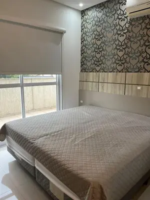 Uma cama ou camas num quarto em Cobertura de 2 suites no centro de Bombinhas by RD Stay