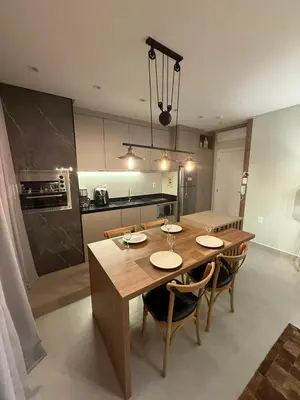 A cozinha ou kitchenette de Apartamento Flat Elegance Bombinhas