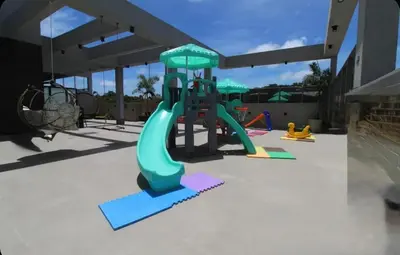 A área de jogos para crianças em Apartamento Flat Elegance Bombinhas