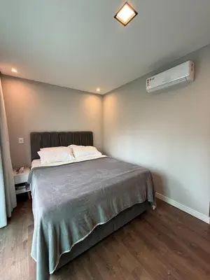 Uma cama ou camas num quarto em Casa 2 no coração de Meia Praia
