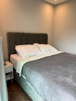 Uma cama ou camas num quarto em Casa 2 no coração de Meia Praia