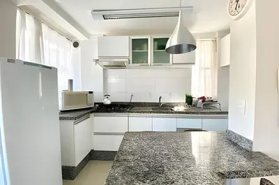 A cozinha ou kitchenette de Loft em Bombas - Excelente Localização - 1 dorm 3 pessoas