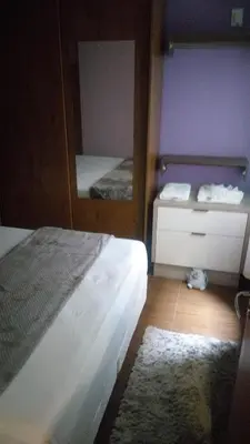 Uma cama ou camas num quarto em Casa 1 Encanto dos Mares