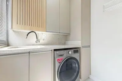 A cozinha ou kitchenette de Apartamento finamente decorado em Bombinhas