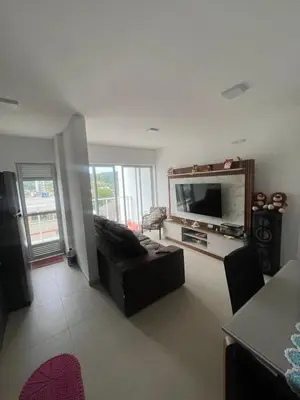 Uma televisão e/ou sistema de entretenimento em Apto Aconchegante com Piscina Ótima Localização