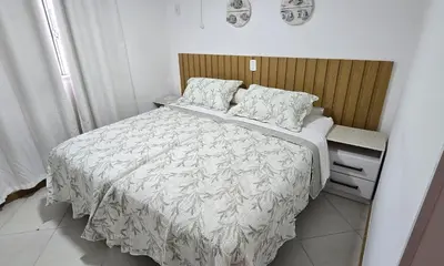 Uma cama ou camas num quarto em Jardim das Américas