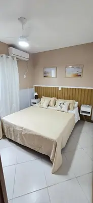 Uma cama ou camas num quarto em Jardim das Américas