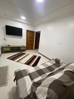 Uma cama ou camas num quarto em Casa em Zimbros Bombinhas