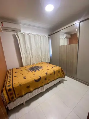 Uma cama ou camas num quarto em Casa em Zimbros Bombinhas