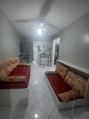 Uma área de estar em Solar das Bromélias, Apartamento amplo para até 6 pessoas - 50m da praia em Bombinhas!