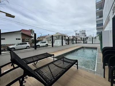 A piscina em ou perto de Residencial Alana - Apartamento a 200m do mar na Praia de Palmas com vista pro mar