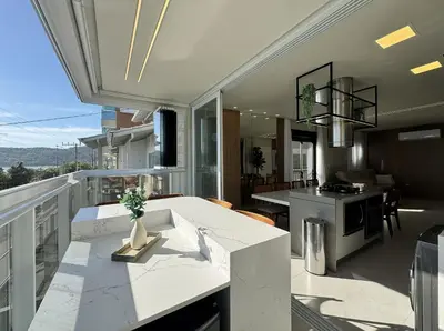 Uma área de estar em Sonho de Palmas 101 - Apartamento de frente para o mar na deslumbrante praia de Palmas, com 3 dormitórios, sendo 2 suítes.