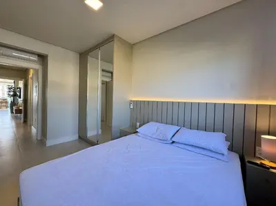 Uma cama ou camas num quarto em Sonho de Palmas 102 - Apartamento de frente para o mar na bela praia de Palmas, com 3 dormitórios, sendo 2 suítes