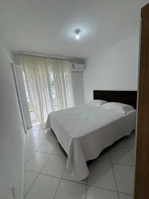 Uma cama ou camas num quarto em Apartamento Bombas