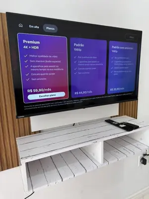 Uma televisão e/ou sistema de entretenimento em Apartamento Bombas