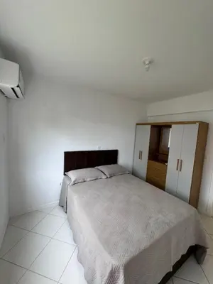 Uma cama ou camas num quarto em Apartamento Bombas