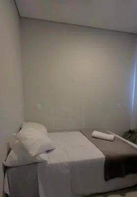 Uma cama ou camas num quarto em Casa com 3 quartos em Bombinhas